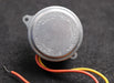 Bild des Artikels SYNCHRON-Elektromotor-Typ-640-Z140RD-5-6-12-78-24V-60CY-5W-1rpm-WellenØ-4,75mm