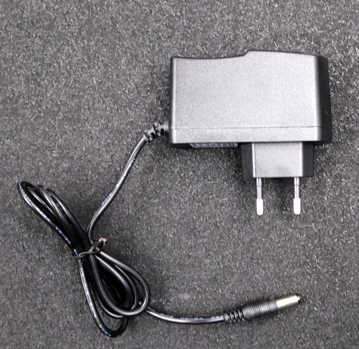 Bild des Artikels 4x-AC/DC-Netzteil-Adapter-XBS-1210-Input:-100-240VAC-1,2A-50-60Hz-Output-12VDC