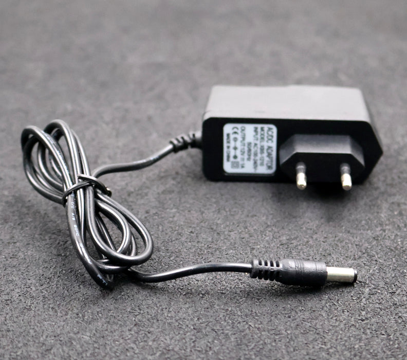 Bild des Artikels 4x-AC/DC-Netzteil-Adapter-XBS-1210-Input:-100-240VAC-1,2A-50-60Hz-Output-12VDC