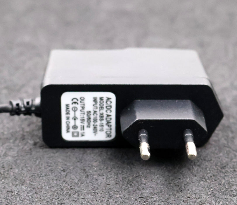 Bild des Artikels AC/DC-Netzteil-Adapter-XBS-1510-Input:-100-240VAC-50-60Hz-Output-15VDC-1A