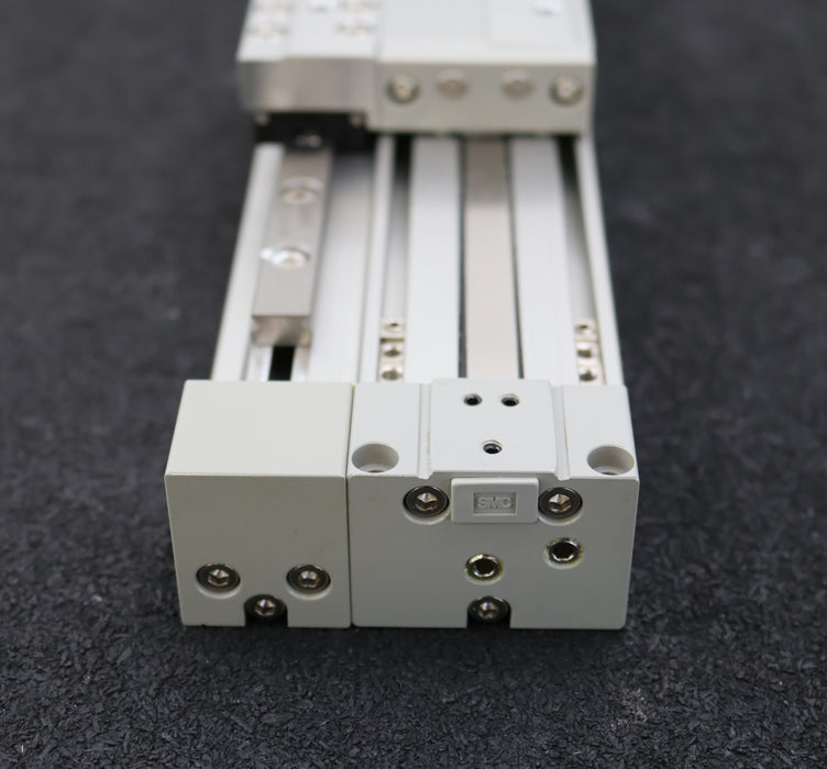 Bild des Artikels SMC-Kolbenstangenloser-Bandzylinder-Typ-MY1H16G-100-max.-0,8MPa