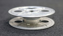 Bild des Artikels KINAX-Filmspule-Nonflam-Sicherheitsfilm-16mm-AußenØ-75mm-Innenvierkant-8x8mm