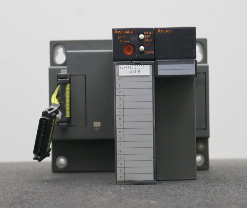 Bild des Artikels MITSUBISHI-MELSEC-PLC-System-mit:-1x-A1S63ADA-1x-A1SG60-gebraucht