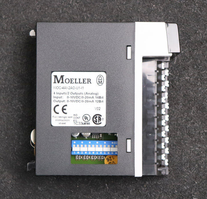 Bild des Artikels MOELLER-PLC-Module-XIOC-4AI-2AO-U1-I1-gebraucht-Abdeckung-fehlt