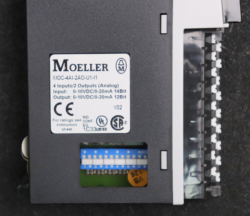 Bild des Artikels MOELLER-PLC-Module-XIOC-4AI-2AO-U1-I1-gebraucht-Abdeckung-fehlt